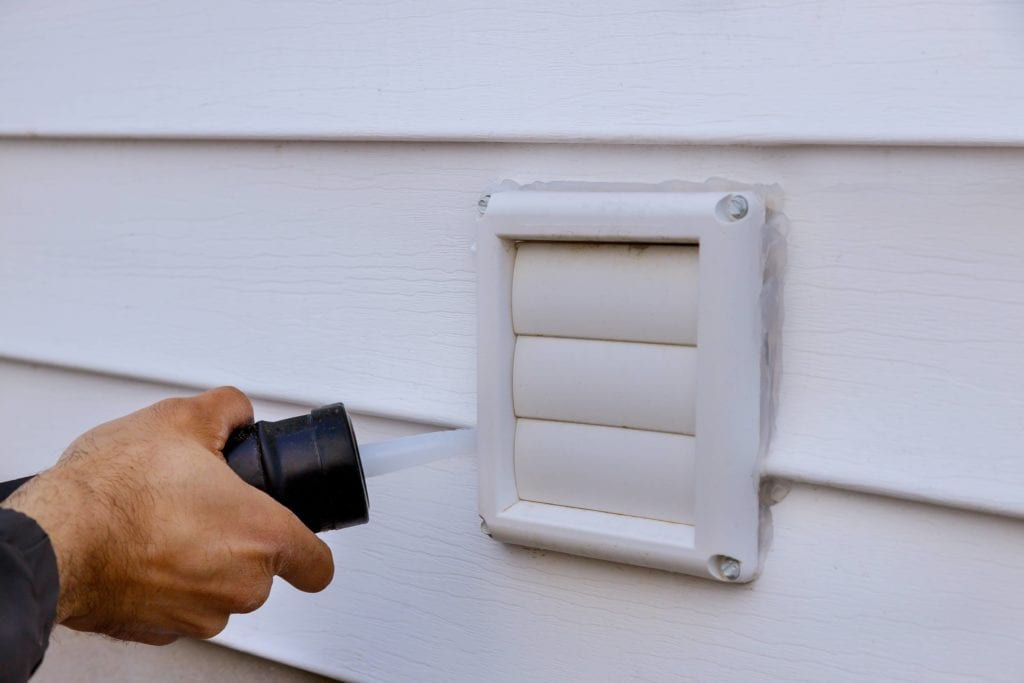 Vent on side of house