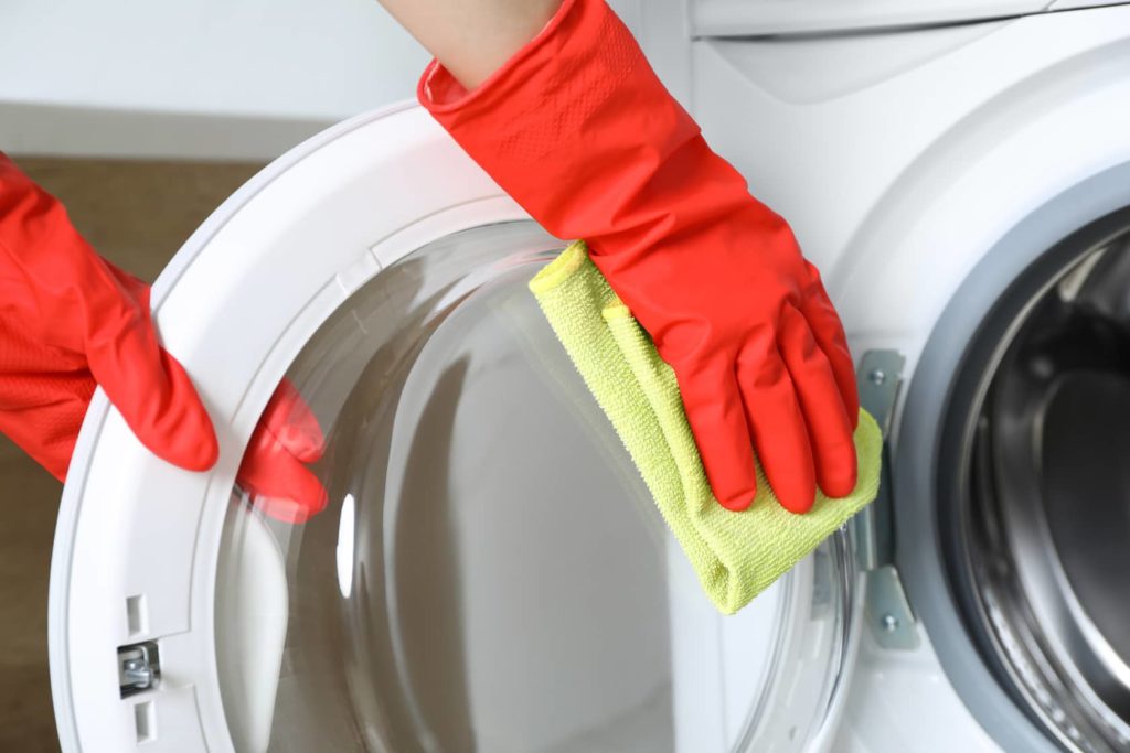 How to clean the front of a washing machine.