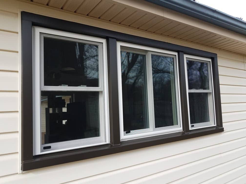 Newly vinyl windows were installed in a group of three.