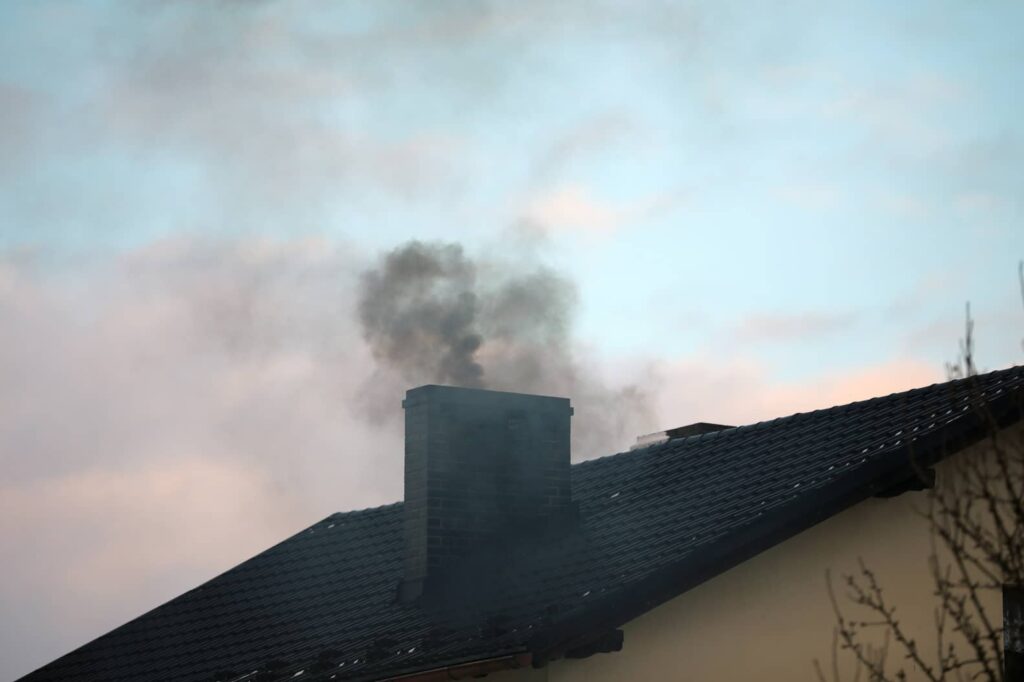 Smoke coming from the chimney could be a clear sign of a potential chimney fire.