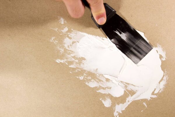 Use spackle to repair any dents.