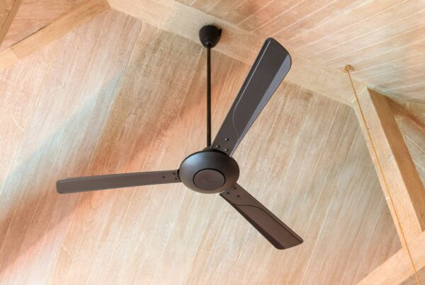 Ceiling fan with a long down rod.